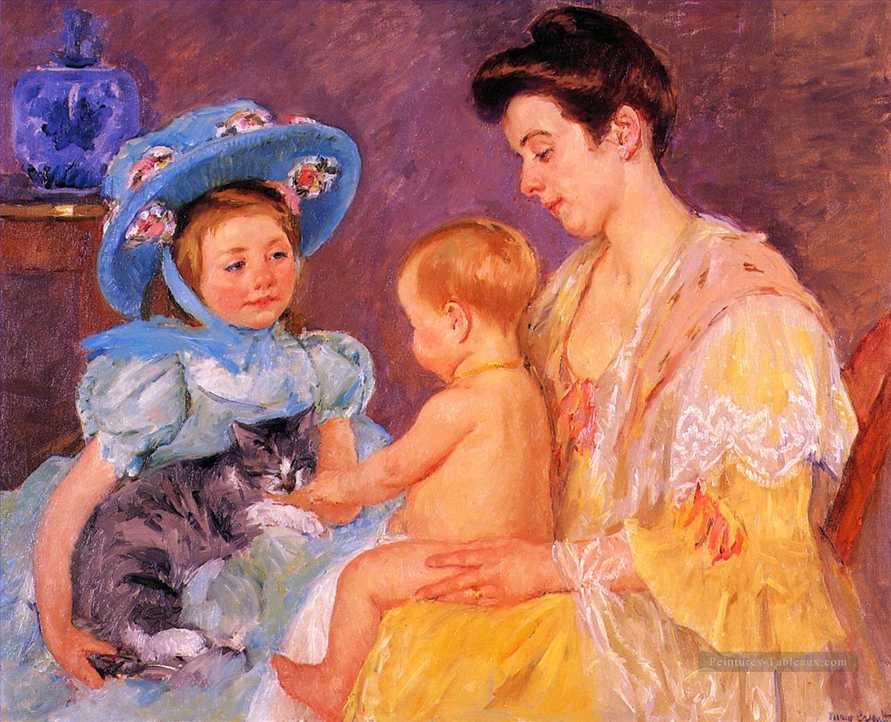 Enfants jouant avec un chat mères des enfants Mary Cassatt Peintures à l'huile